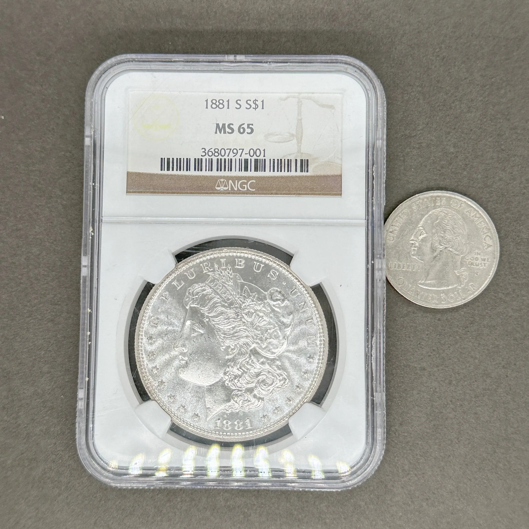 Estate 1881 0.900 Fine Silver Morgan Dollar NGC MS65