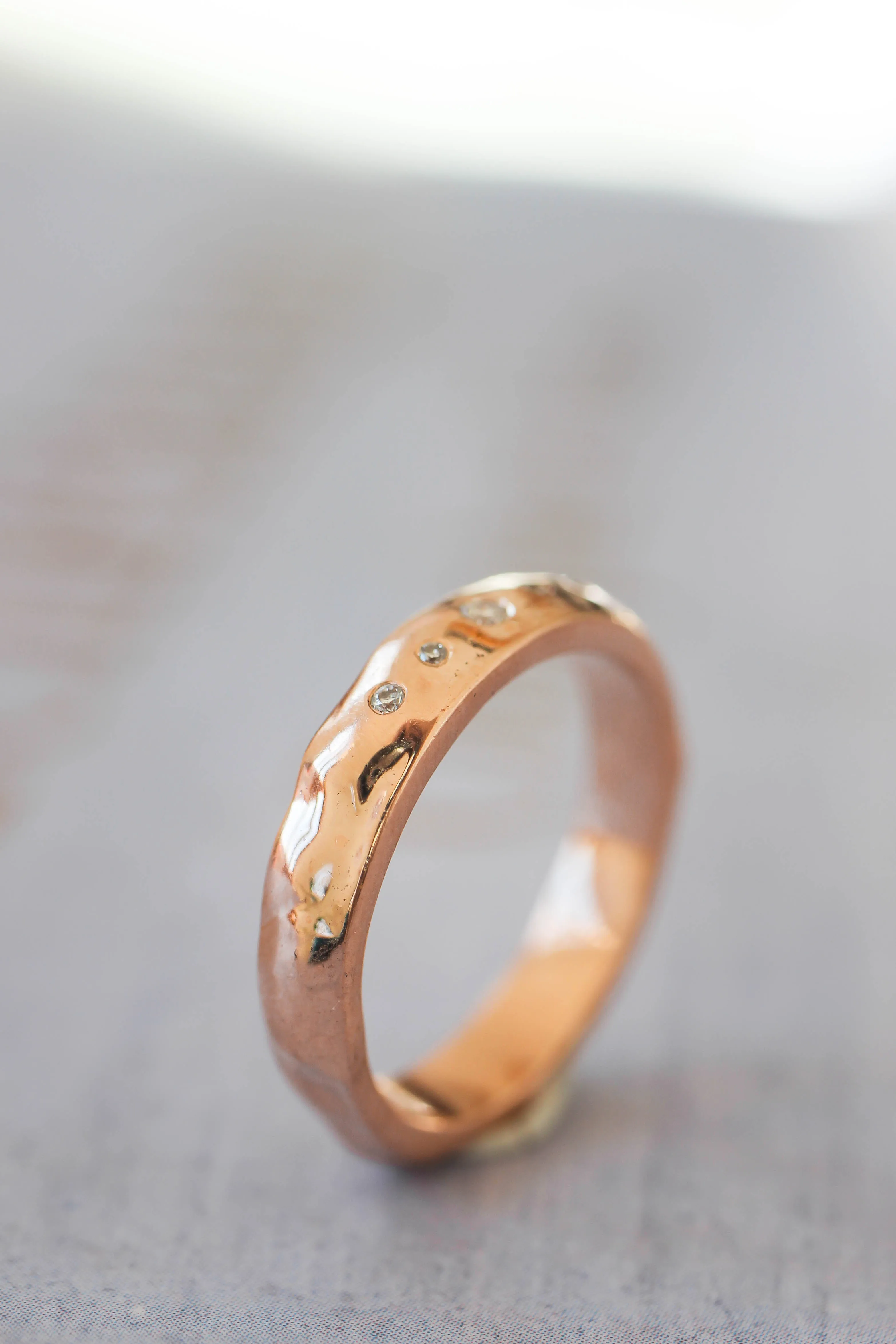 Organic wedding band with five diamonds, unisex ring