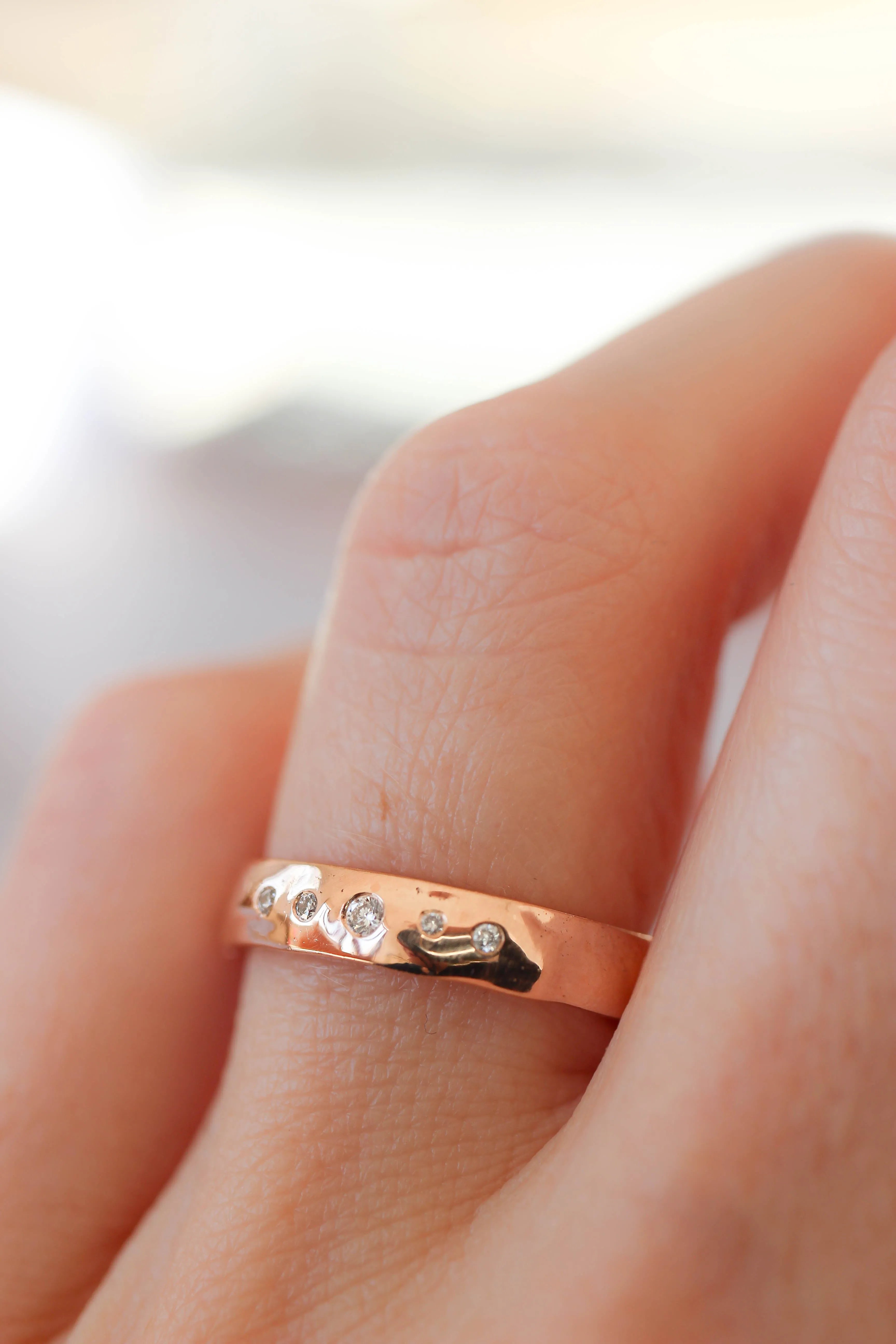 Organic wedding band with five diamonds, unisex ring
